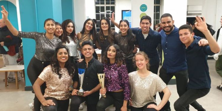 A group portrait of the the bhangra society, including Dhanika Kapoor.