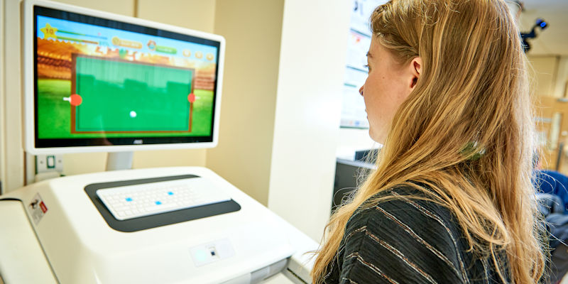 Person using the stroke rehabilitation robot