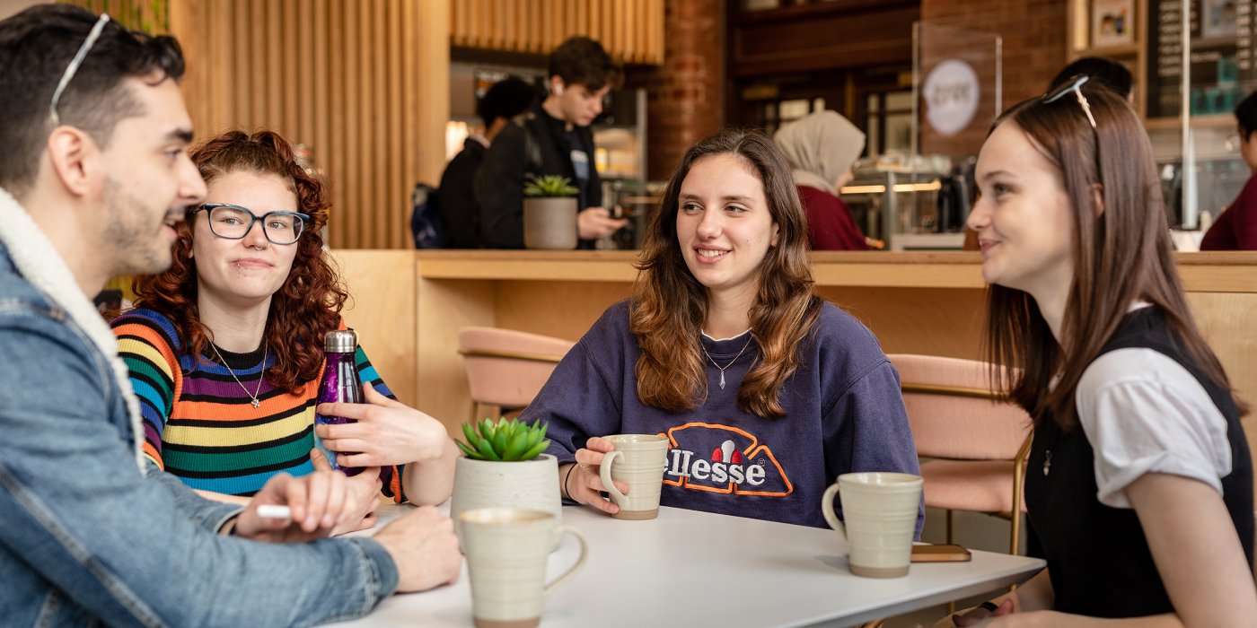 Students socialising in the Bragg building cafe
