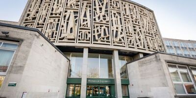 A cropped photograph of the front entrance to the School of Mechanical Engineering building.