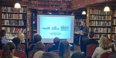 Image of a University of Leeds student from the School of Civil Engineering presenting her work at the West Yorkshire Society of Architects prize-giving event at Leeds Library.