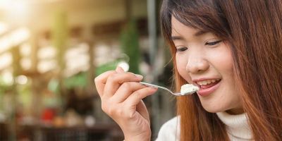 Image of a woman eating