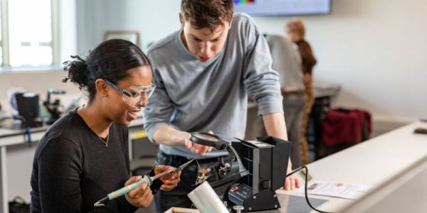 Two students working on an experiment in the first year physics lab at the University of Leeds.