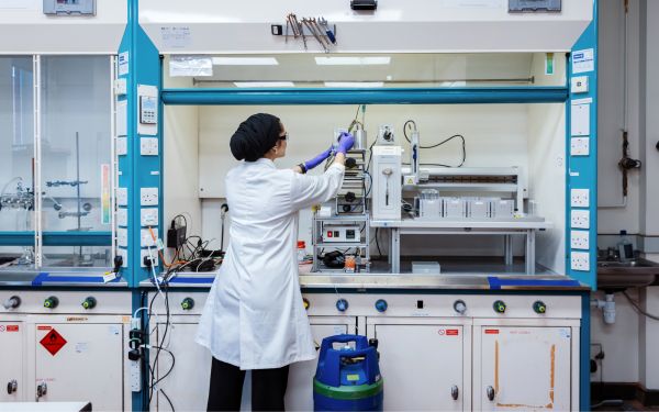 Female student in the digital chemistry lab