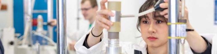 Undergraduate student working in the geotechnics lab