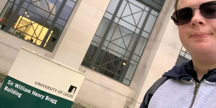 Computing student selfie outside of the Bragg building