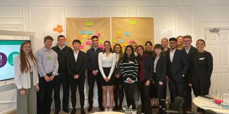 Farida in a group shot at the Q5 event in London.