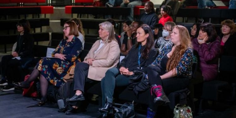 Attendees sat at a Women in STEM conference.