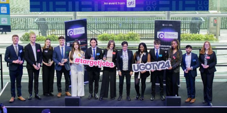 A group photo of the award winners on stage at the targetjobs Undergraduate of the Year Awards 2024 ceremony.