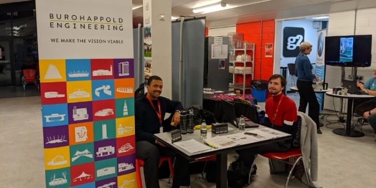 Benjamin Matheson sat at a stall for a trade fair while undertaking his industrial work placement.