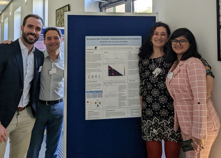 Aindrila Basu at a conference with academics after winning prize
