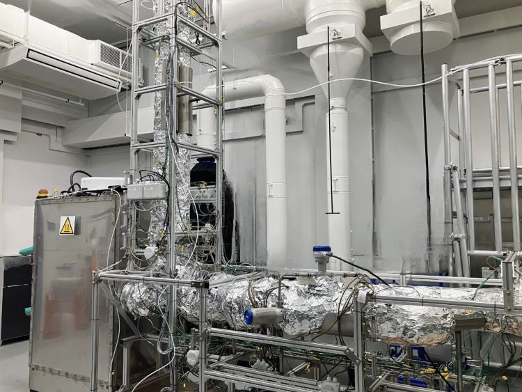 The salt loop's complex machinery, featuring metal pipes and a large metal control box.